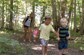 Family hicking in the woods